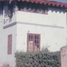 White house with red roof