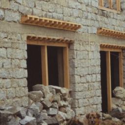 Stone brick houses under co...