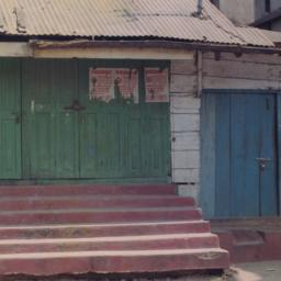 Shuttered storefront, Kalim...