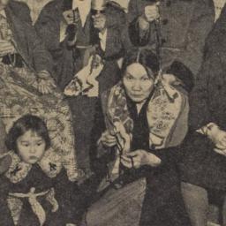 Group of women and two chil...