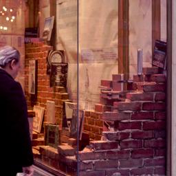 People viewing window display.