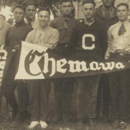 Group of Men Holding Pennan...