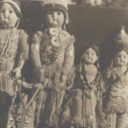 Row of Dolls in Native Amer...