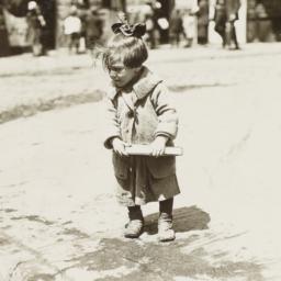 Girl Looking at Curb