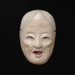 Small Mask Of Elderly Woman