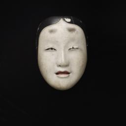 Small Mask Of Young Woman